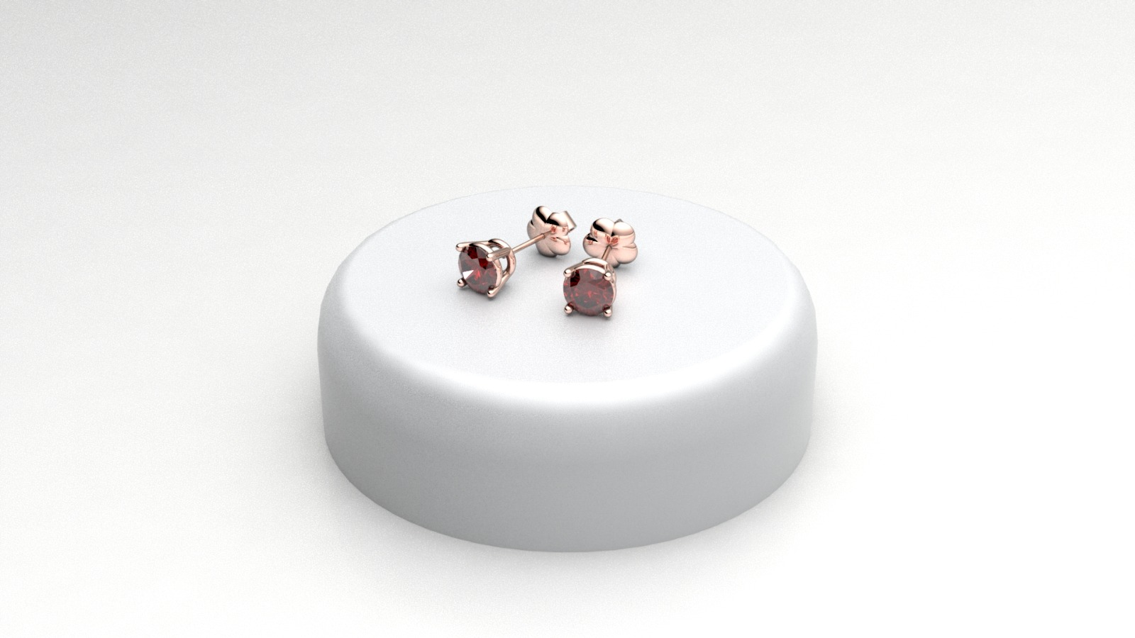 Orecchini punto luce 4 griffe con rubini in oro rosé