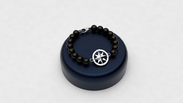 Bracciale perle nere con rosa dei venti